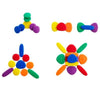 Un grupo de juguetes coloridos sentados en la parte superior de una superficie blanca, una escultura abstracta de Keos Masons, Polycount, Toyism, Angular, Polycount, hecho de goma.
