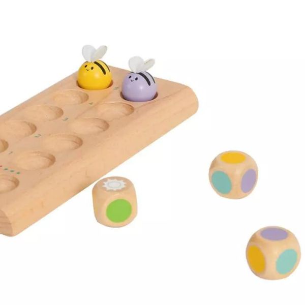 Un juguete de madera con tres bolas de colores diferentes, una foto de stock de Francis Helps, ganador del concurso de Pinterest, letterismo, foto de stock, trypophobia, patrón repetitivo.