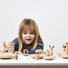 Load image into Gallery viewer, Una niña pequeña jugando con juguetes de madera en una mesa, una escultura abstracta de Helen Biggar, presentada en dribble, arte cinético, profundidad de campo poco profunda, behance hd, hecho de cartón.