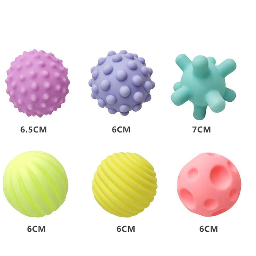 Un conjunto de cuatro bolas con diferentes colores, una foto de stock por Lü Ji, Policontar, Remodernismo, hecho de goma, Trifobia, hecho de plástico.
