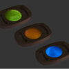 Tres luces de colores diferentes en una superficie negra, una representación 3D de Évariste Vital Luminais, destacada en dribble, holografía, Adafruit, iluminación volumétrica, bioluminiscencia.