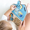 Un bebé está jugando con un juguete de madera, un rompecabezas de Lydia Field Emmet, presentado en dribble, los automatistas, adafruit, circuitry, pixel perfect.