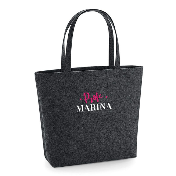 Una bolsa negra con letras rosas sobre ella, una estrella por Perle Fine, ganador de un concurso de Pinterest, plástico, estrella, detalle ultrafino, hecho de plástico.