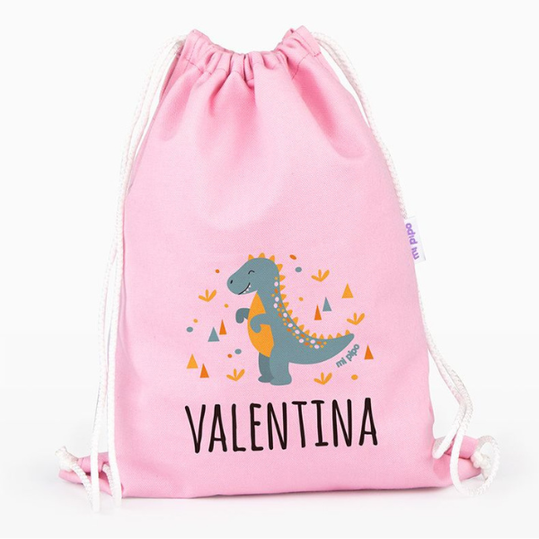 Una bolsa de dibujo rosa con un dinosaurio en ella, un pastel de Verónica Ruiz de Velasco, ganador de un concurso de Pinterest, arte ingenuo, #myportfolio, hecho de cuentas y hilo, ganador del concurso.