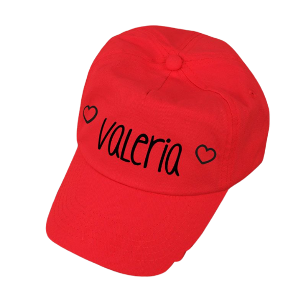 Una gorra roja con la palabra Valeria escrita en ella, una representación digital por Jorge Velarde, shutterstock, rasquache, velvia, vray, encantador.