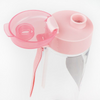 Una botella con una tapa rosa y una cinta rosa, una foto de stock por Yuki Ogura, dribble, plástico, detalle ultrafino, hecho de plástico, sin género.