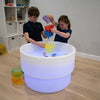 Load image into Gallery viewer, Un par de niños jugando con una mesa de agua, una escultura abstracta de Keos Masons, destacada en dribble, arte interactivo, bioluminiscencia, iluminación volumétrica, transfer de tinta.
