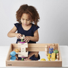 Una pequeña niña jugando con un juguete de madera, una escultura abstracta de Rube Goldberg, destacada en dribble, arte cinético, adafruit, diorama, arte académico.