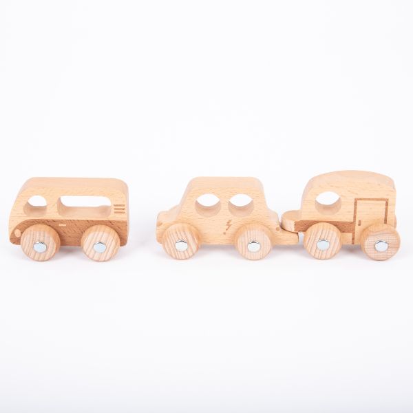 Tres camiones de juguete de madera sobre un fondo blanco, una representación 3D de Louise Nevelson, destacada en dribble, movimiento de artesanía, hecha de cartón, fotografía de estudio, trazado de vray.