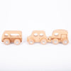 Tres camiones de juguete de madera sobre un fondo blanco, una representación 3D de Louise Nevelson, destacada en dribble, movimiento de artesanía, hecha de cartón, fotografía de estudio, trazado de vray.