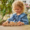 Load image into Gallery viewer, Una pequeña niña jugando con juguetes de madera en un jardín, un rompecabezas de Louisa Puller, presentado en Pinterest, movimiento de artes y oficios, hecho de cartón, patrón repetitivo, profundidad de campo.