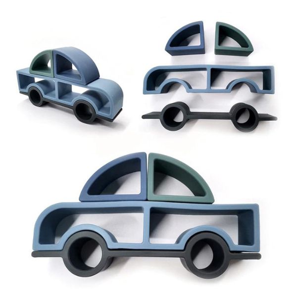 Un conjunto de tres coches de juguete sentados uno encima del otro, una escultura abstracta por Richard Artschwager, tendencia en Deviantart, arte de concreto, hecho de goma, hecho de plástico, ortogonal.
